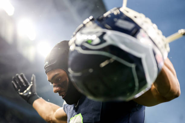 Coby Bryant #8 of the Seattle Seahawks celebrates the win against the Arizona Cardinals at Lumen