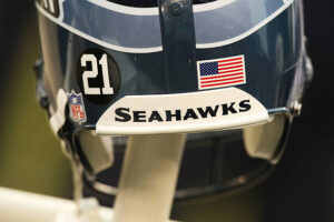   A Seattle Seahawk helmet is stamped with #21 in honor of murdered