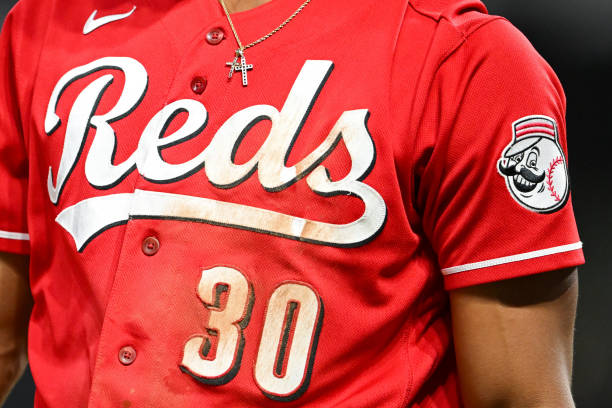 closeup view of the Cincinnati Reds logo on the jersey worn by