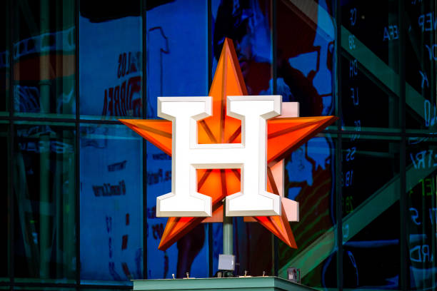 Houston Astros logo in the seventh inning of an MLB baseball game between the Houston Astros and the Texas 