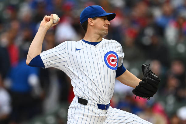 Starting pitcher Kyle Hendricks #28 of the Chicago Cubs throws a pitch in the first inning against